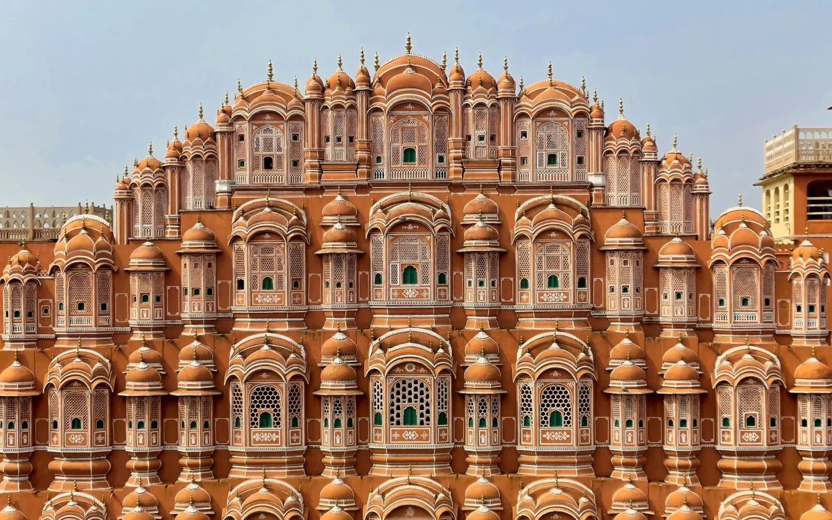 Pink sandstone façade of Hawa Mahal in Jaipur